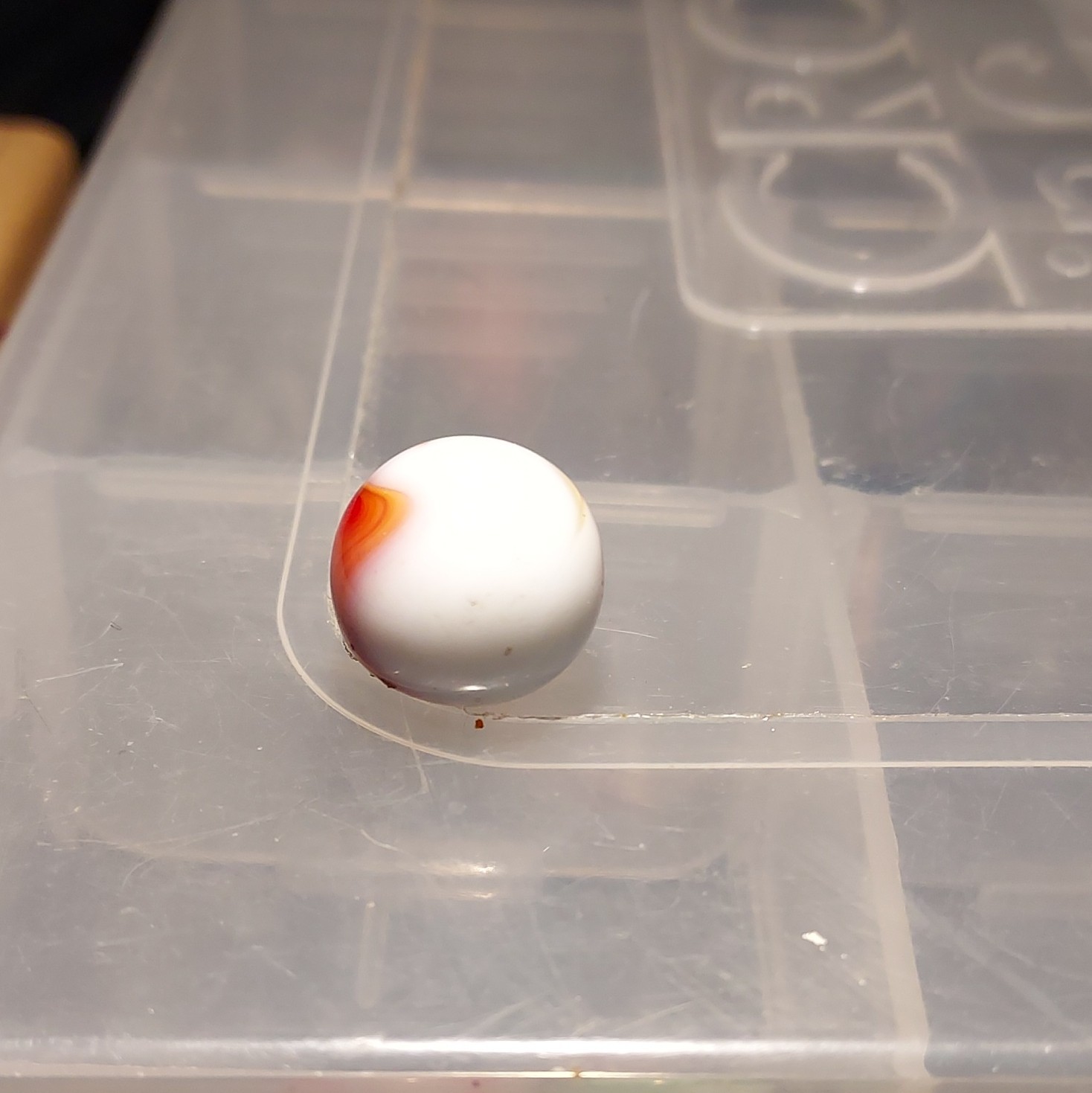 White Glass Toy Marble – Red/Orange & White Swirl, Single, Ages 4+