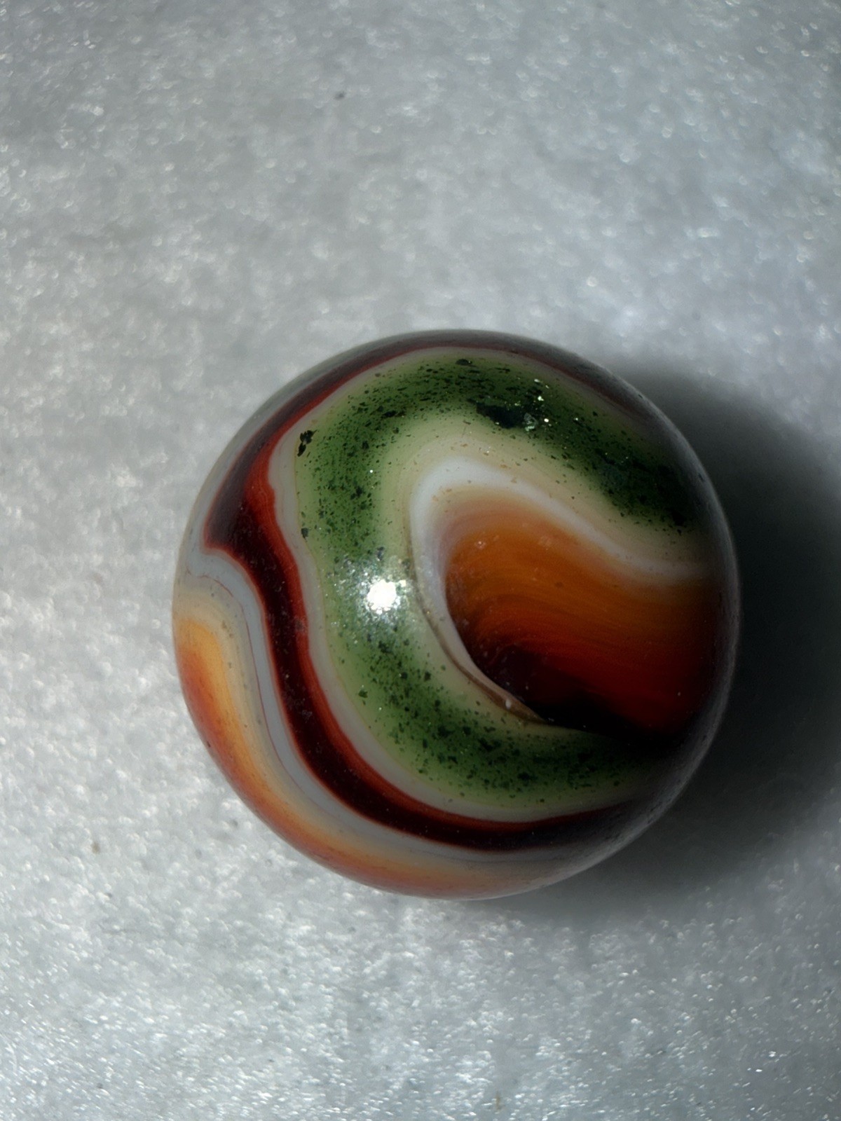 JABO Joker 1 (JERK) Collector Marble : Cranberry Apricot & Aventurine Swirl. .74