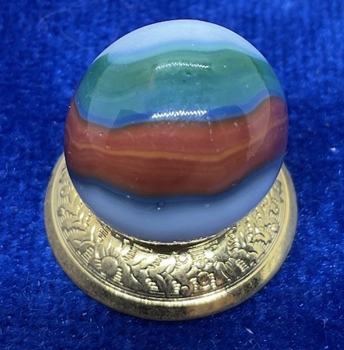 A Vintage Marble King Blended Three Color Marble. Measures .62” Mint Condition.
