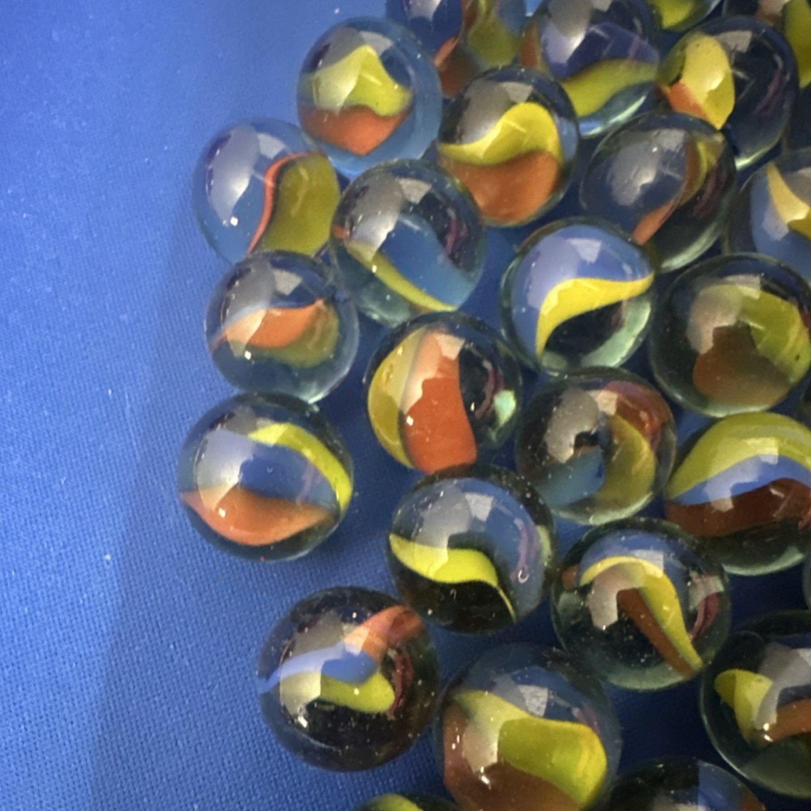 Cat’s Eye Glass Toy Marbles Lot Machine . unknown age