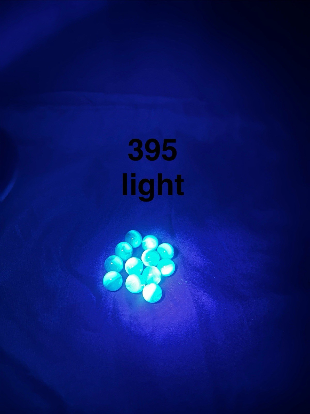 12 Jabo Uranium UV 395 & 365 reactive Blue/White Swirl Glass Marbles Soft Glow