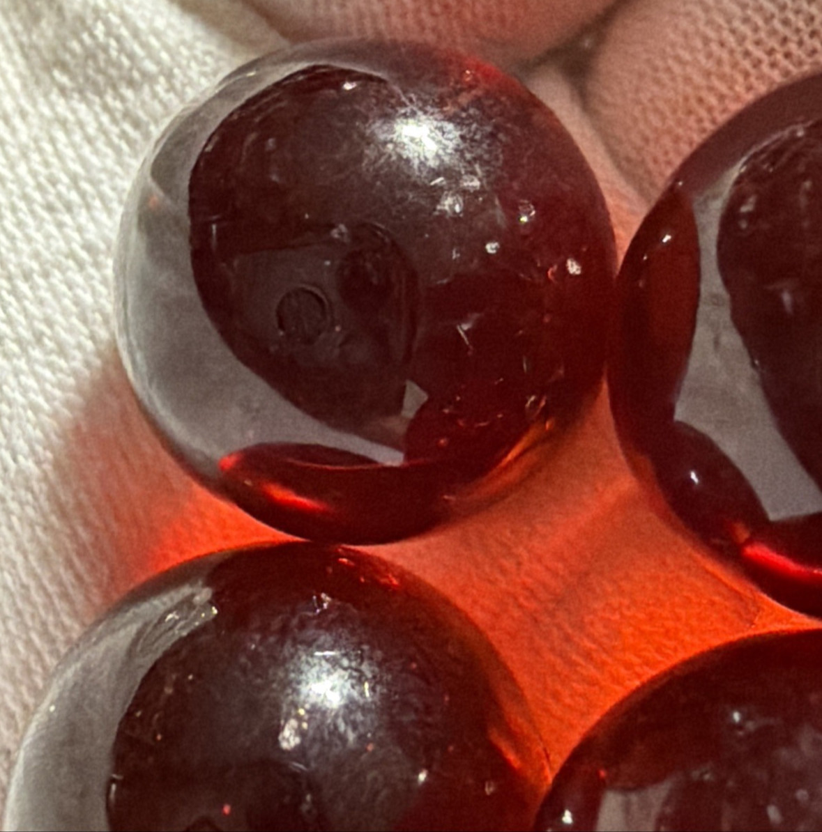 Vintage Lot of 4 Clear Ruby Red Cadmium Slag Glass Marbles UV Reactive As Is
