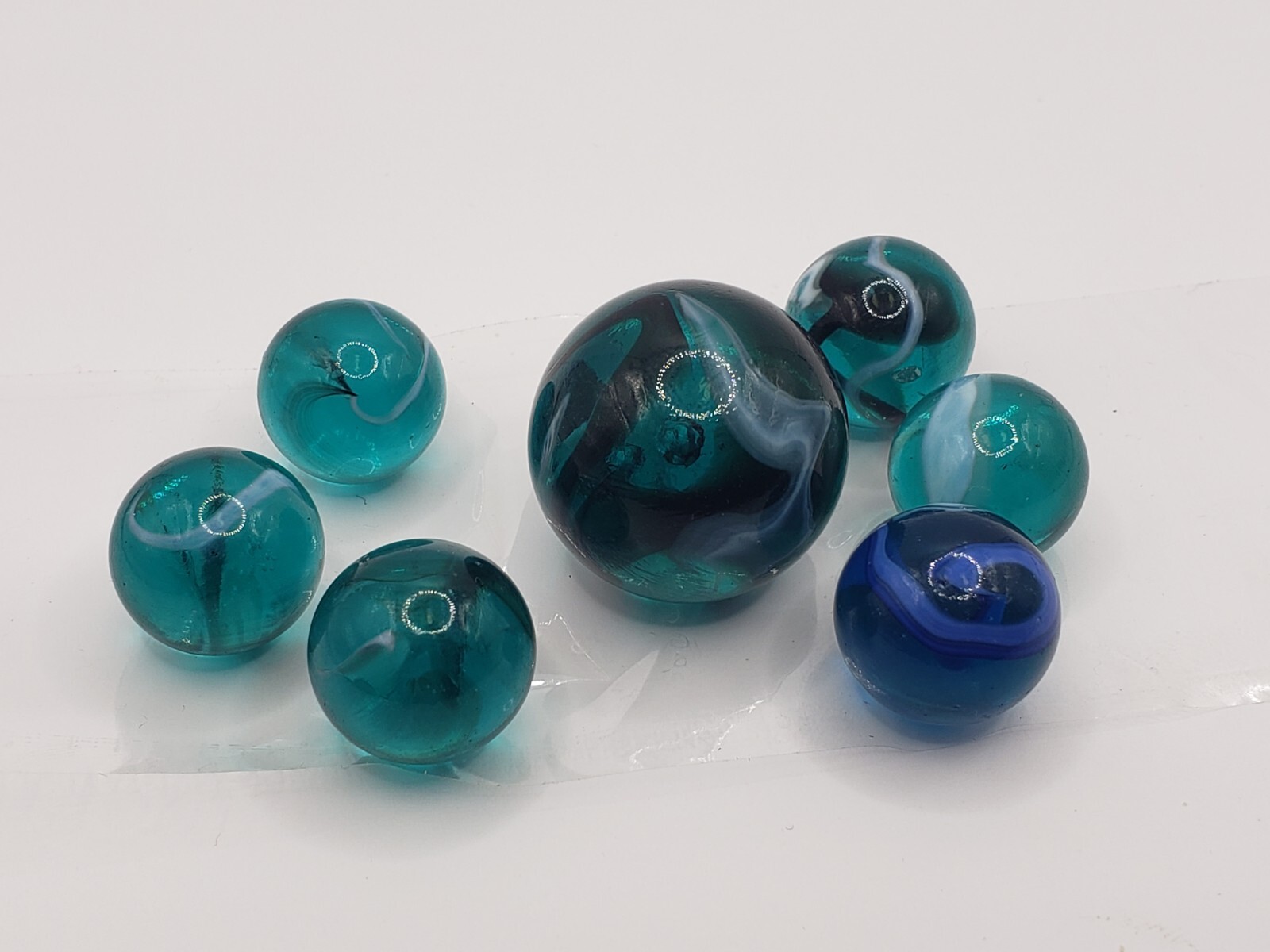 Vintage Unique Swirl Shooter Set Marbles Lot of 7 Translucent Blue White & Black