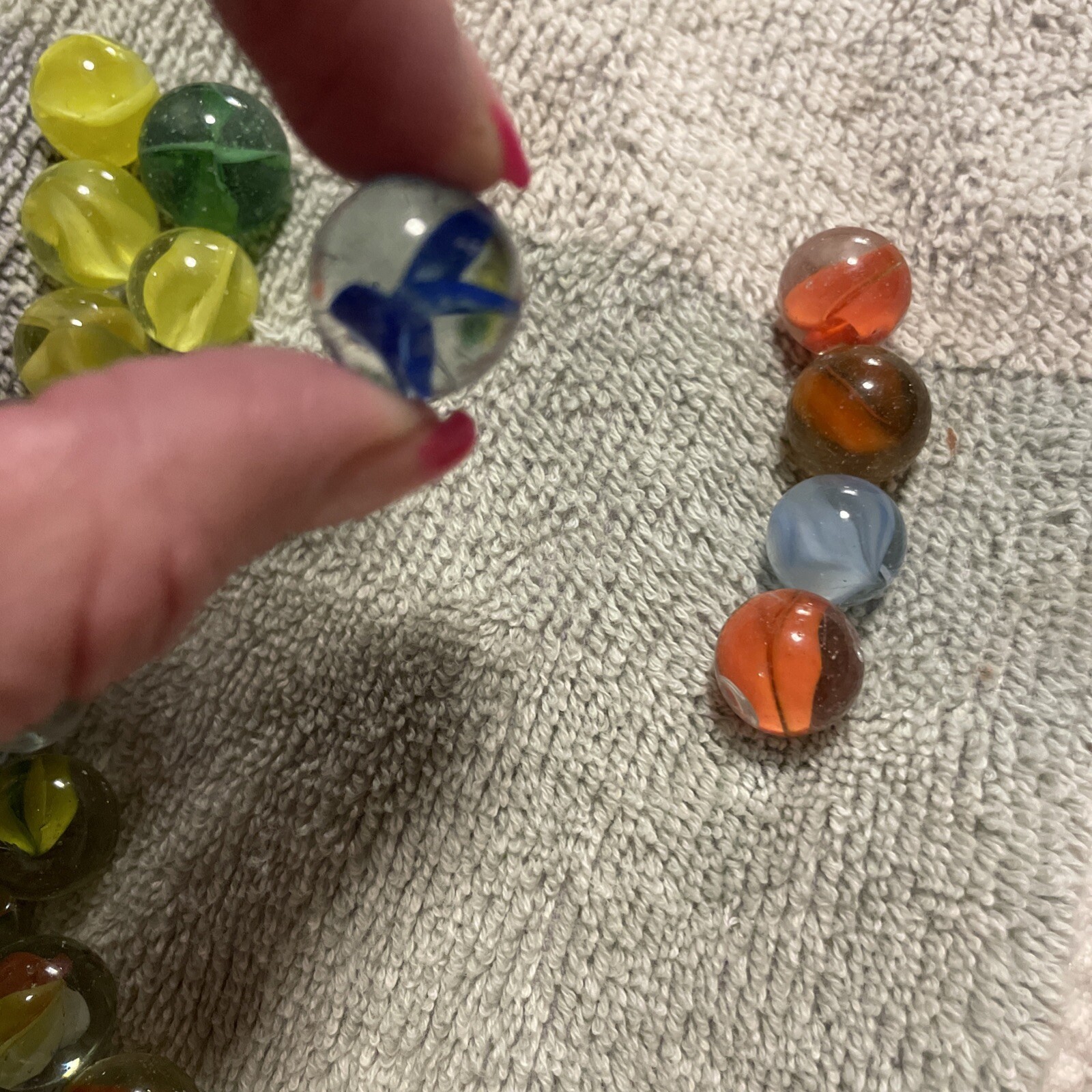 1930-1940’s cat eye 4 vein marbles. Total 12, 1 In, .75 , 10 .50