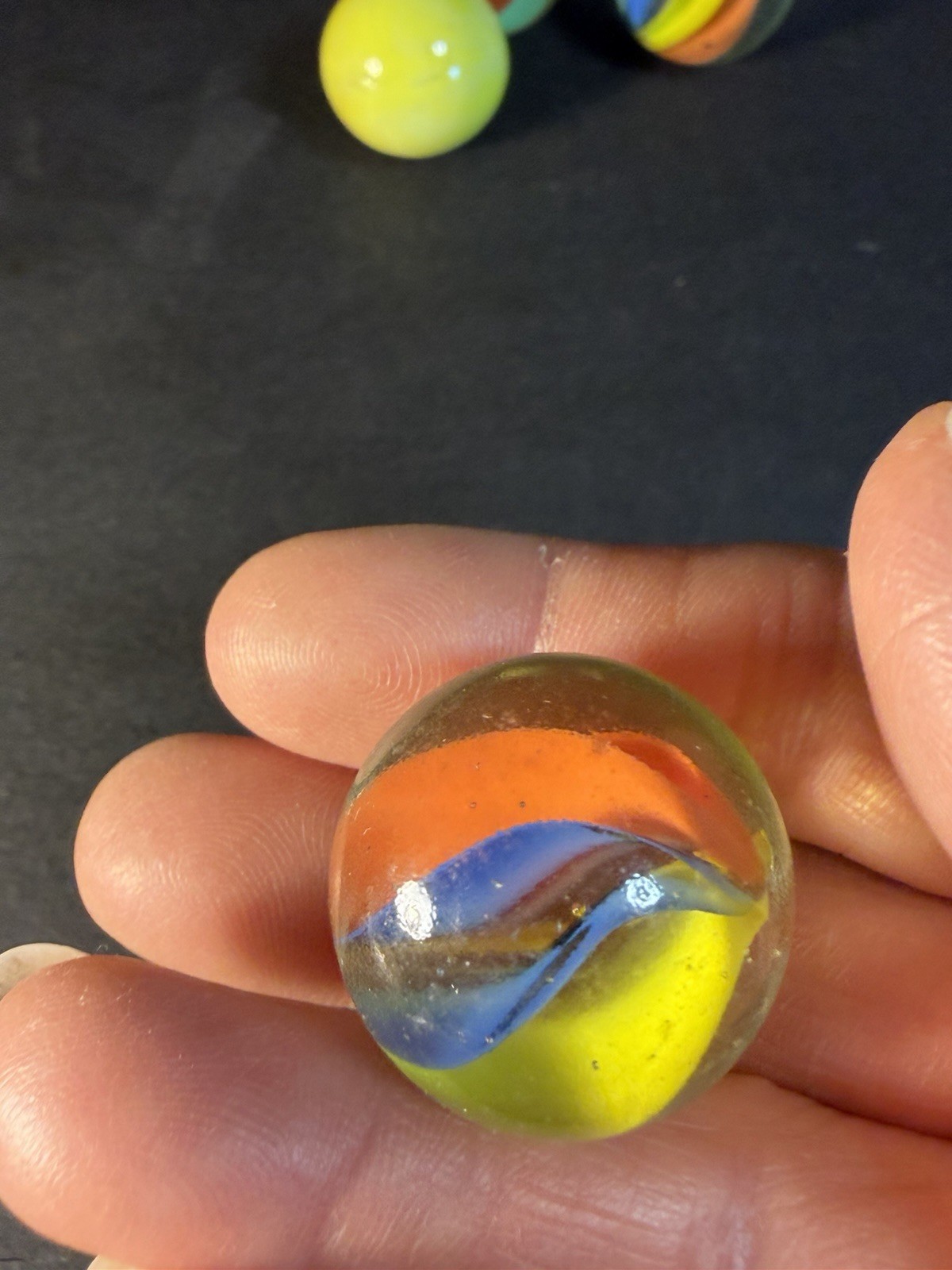 6 Cats Eye 1” Shooter Marbles Plus Two Other Solid Color Marbles