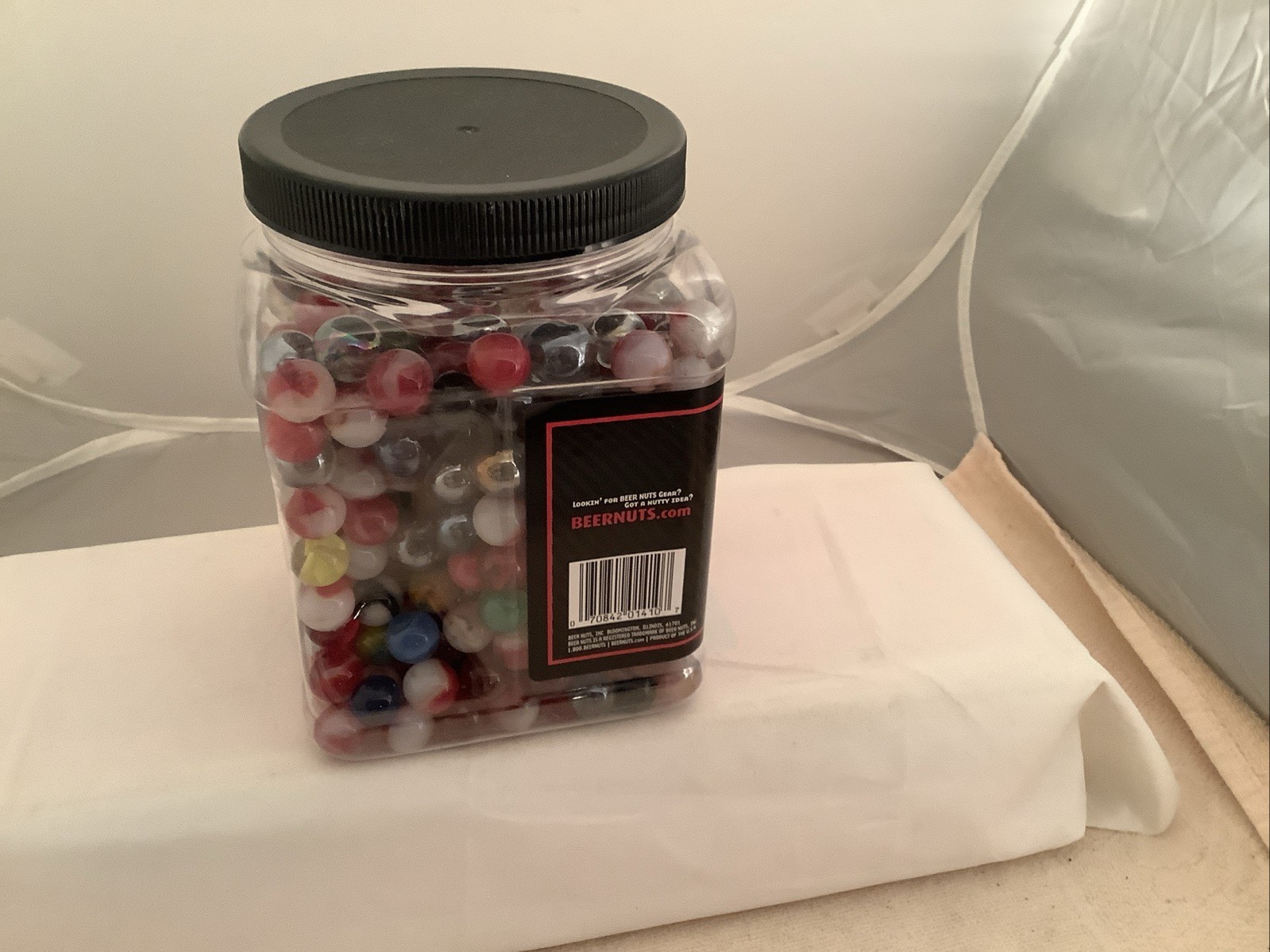 Plastic Bottle filled With A Mixture Of Marbles Found In A Garage.