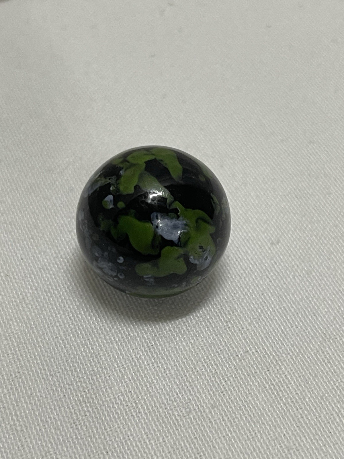 Vintage 0.95” Vacor Planet Glass Marble Shooter Green Black White Speckled