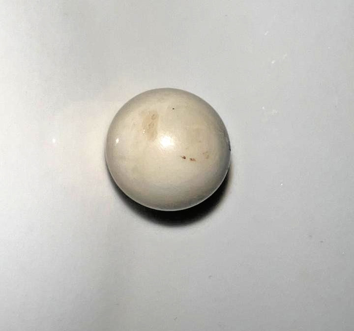 21 vintage handmade glass marbles with colorful swirls and unique patterns.