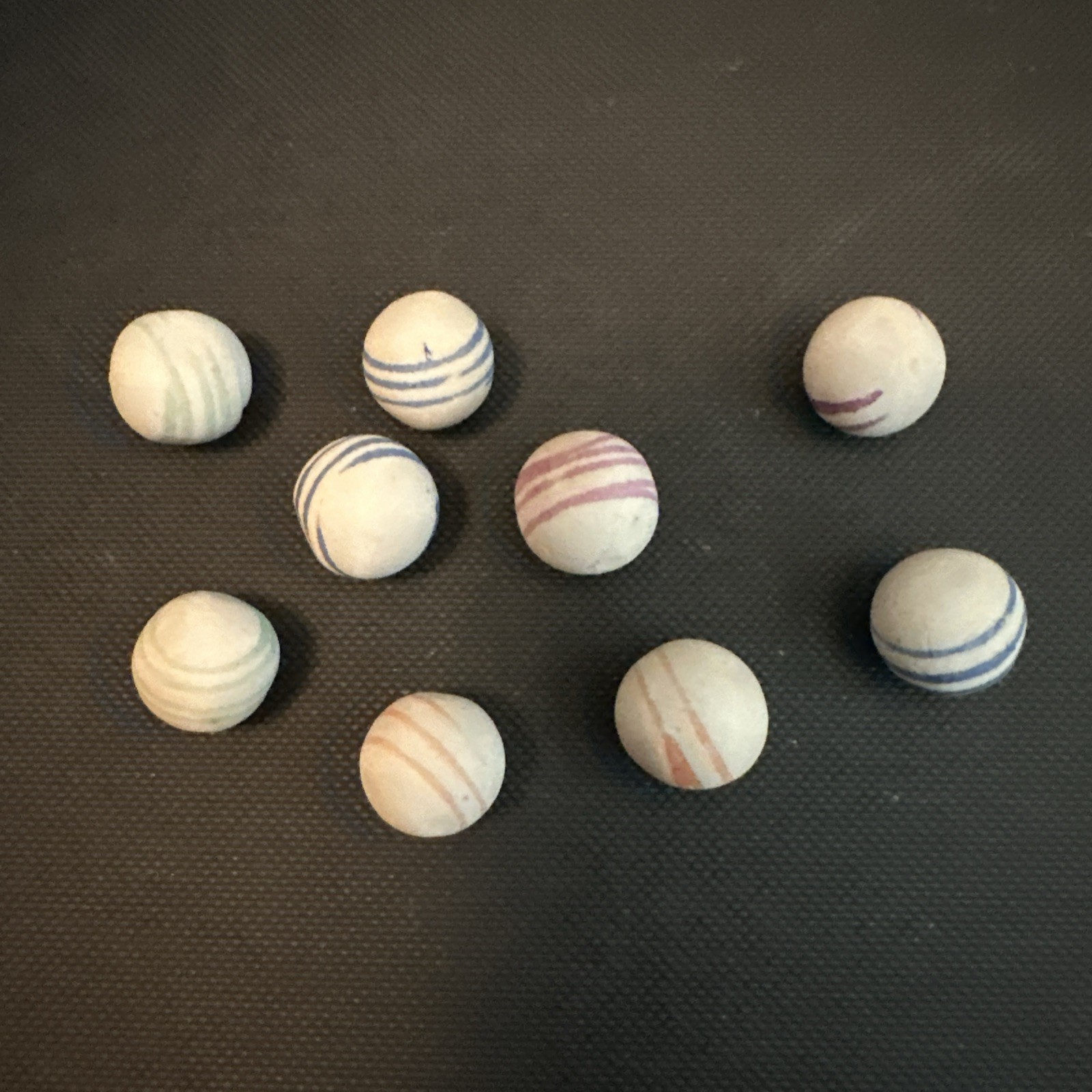 Old Lot of 9 German China Marbles Unglazed Helix Lined