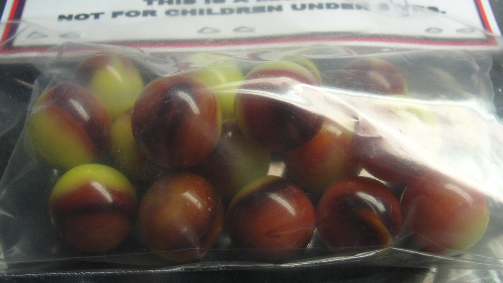 Jabo KETCHUP & MUSTARD UV marbles in bag signed by Jim King glow w/ blacklight