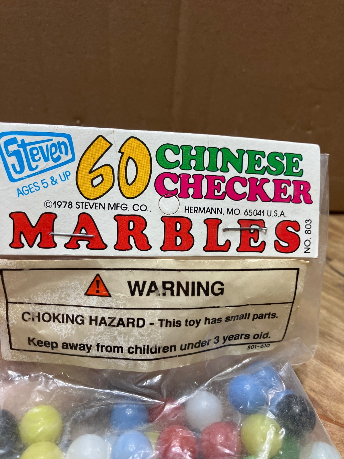 New, Steven 1978, 60 count Chinese checker marbles