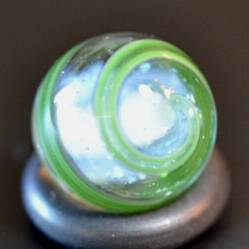 BRYAN TRILLAS GLASS MARBLE/.560″-WHITE & DICHROIC CORE W/BLACK& GREEN BLACKLIGHT