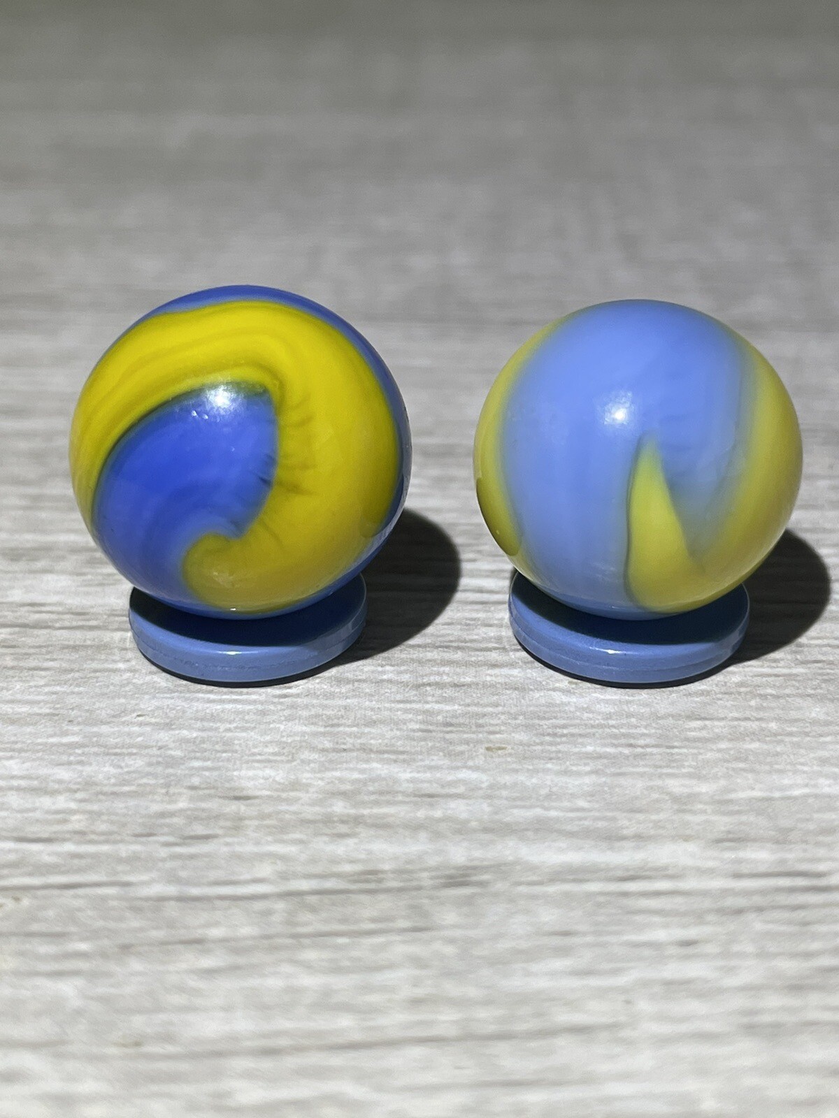 Two Akro Agate Cub Scout Corkscrews Vintage Marbles