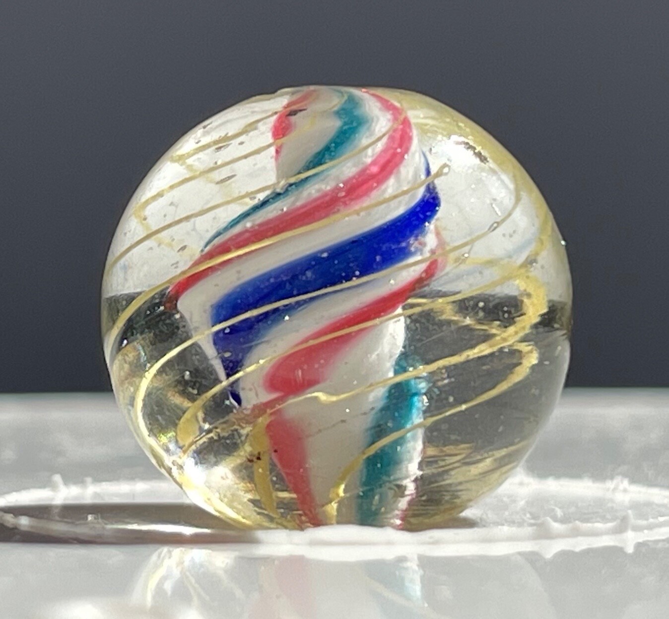 Twisting Red/Blue/Green On A Solid White Core Marble 16mm (5/8”)