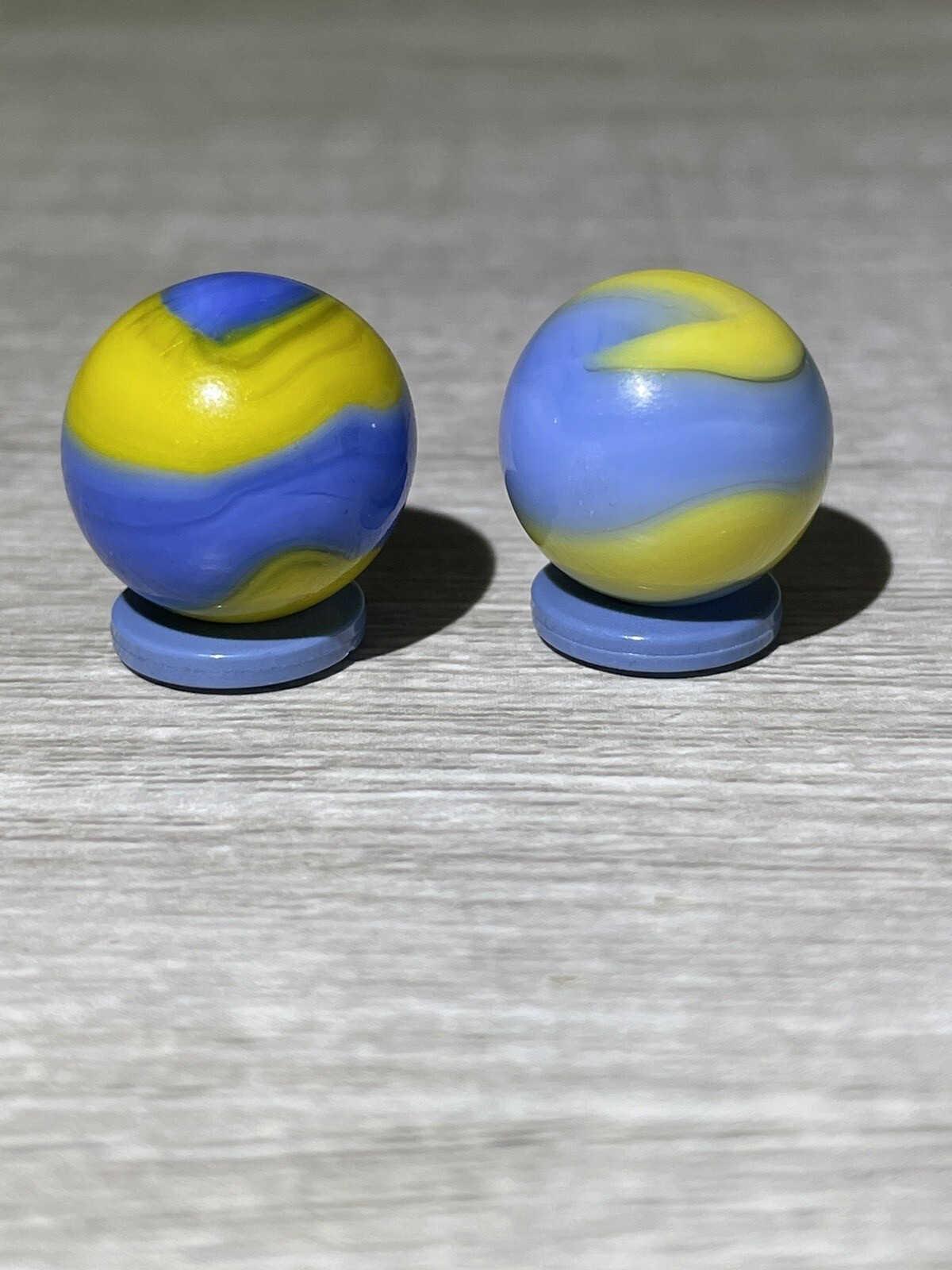 Two Akro Agate Cub Scout Corkscrews Vintage Marbles