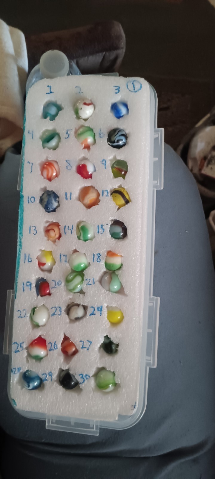 old marbles I dugout of a playground pick a number make offer