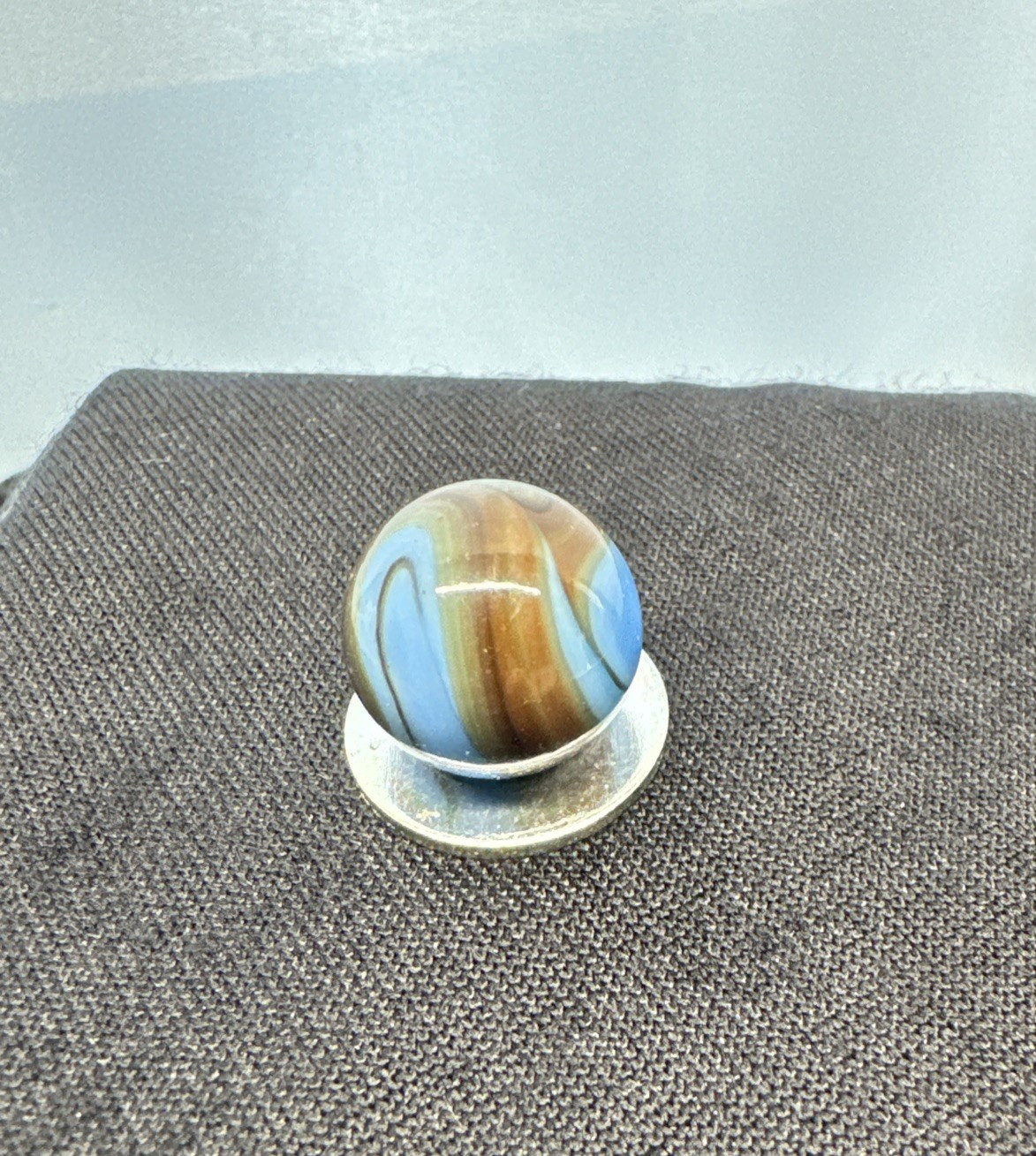 Christiansen Agate Opaque Blue Base With Brown Swirls..63″ Wet Htf Brown