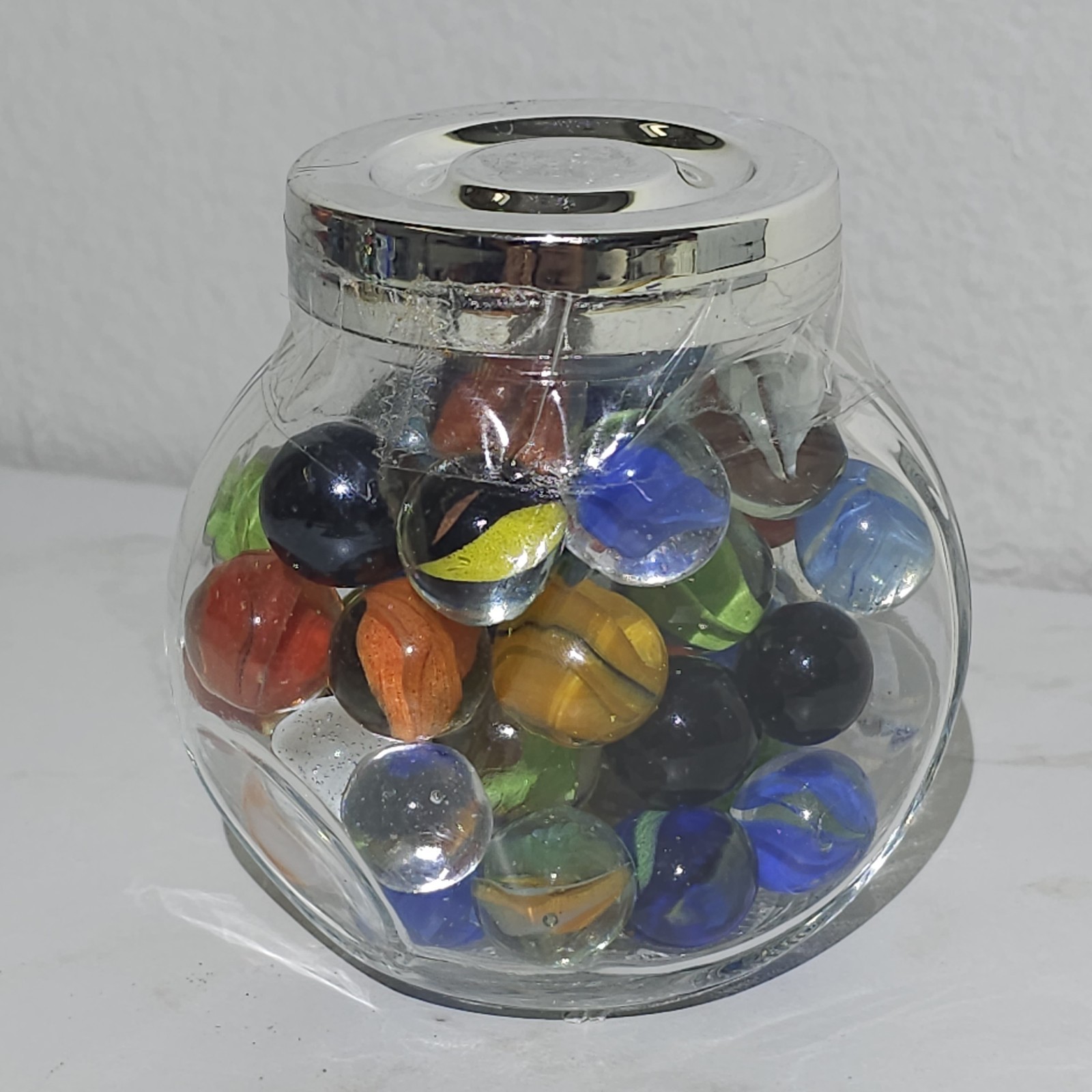 Glass Jar Of Vintage Marbles