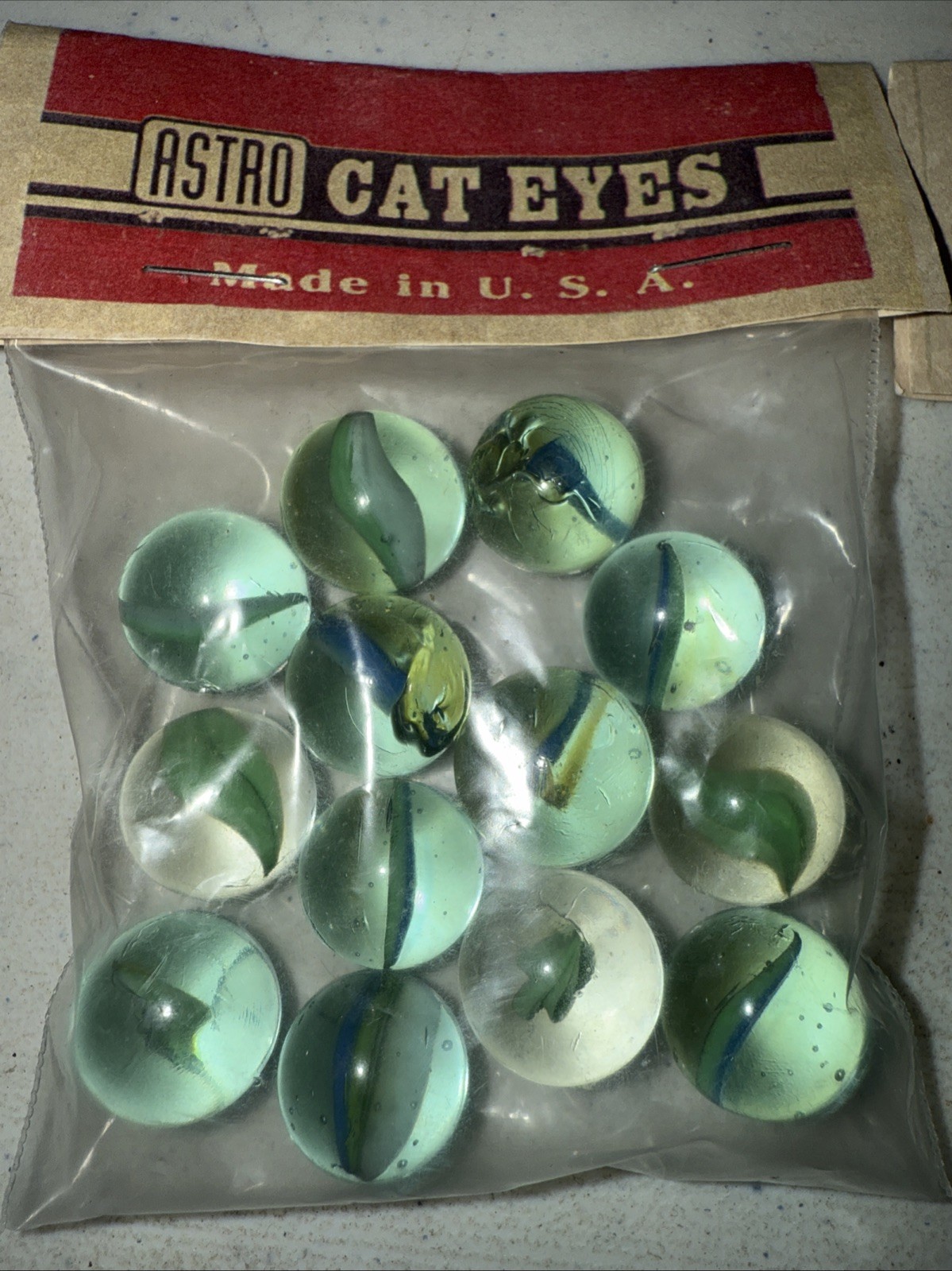 Vintage ASTRO CAT EYES MARBLES 16 count NOS