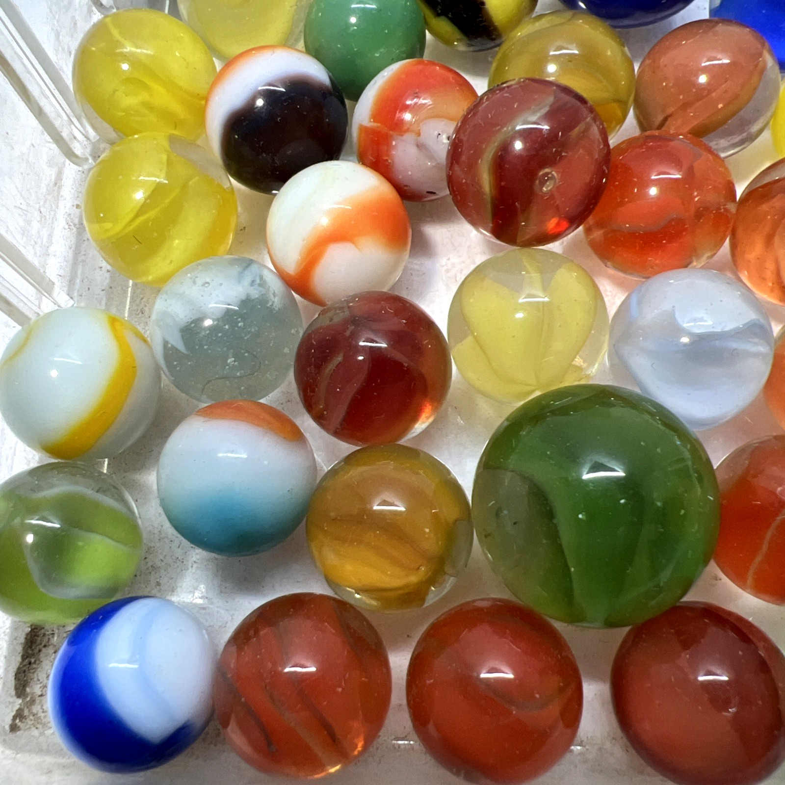Estate Item: Antique Vintage Lot Of Clear/Swirl Glass Marbles 54 Pc Lot #1