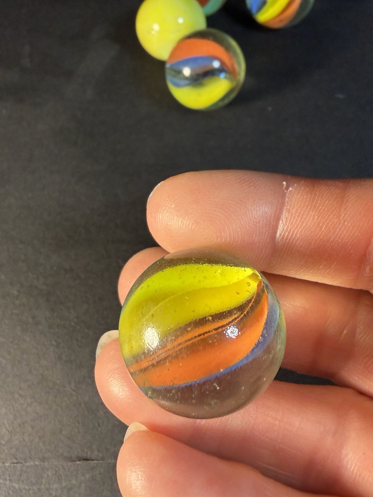 6 Cats Eye 1” Shooter Marbles Plus Two Other Solid Color Marbles