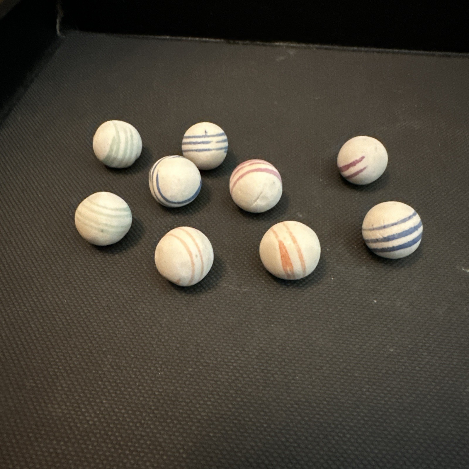 Old Lot of 9 German China Marbles Unglazed Helix Lined