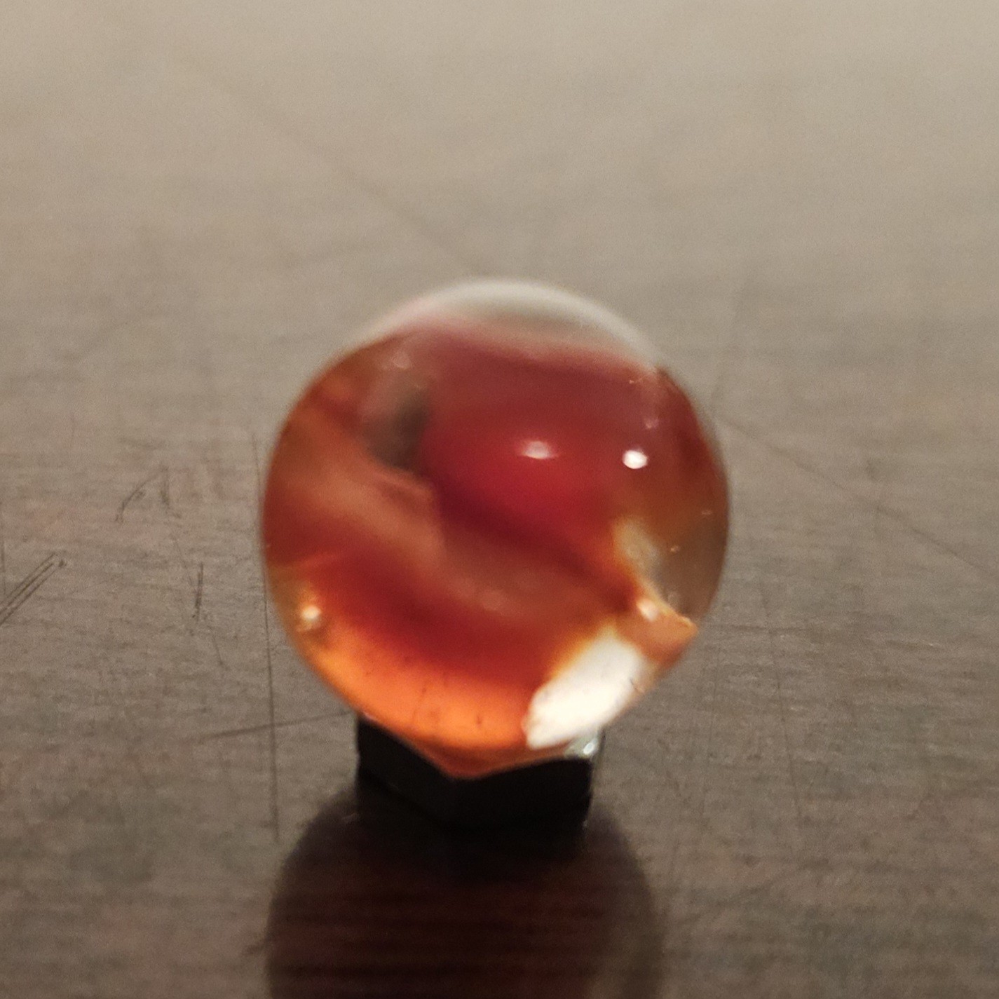 C E Bogard Orange 4- Lobe Floppy Cats Eye Clear Glass .593 Marble