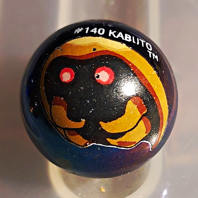 #140 KABLITO Glass Toy Marble – Kabuto Character Design, Machine Made, Ages 17+,