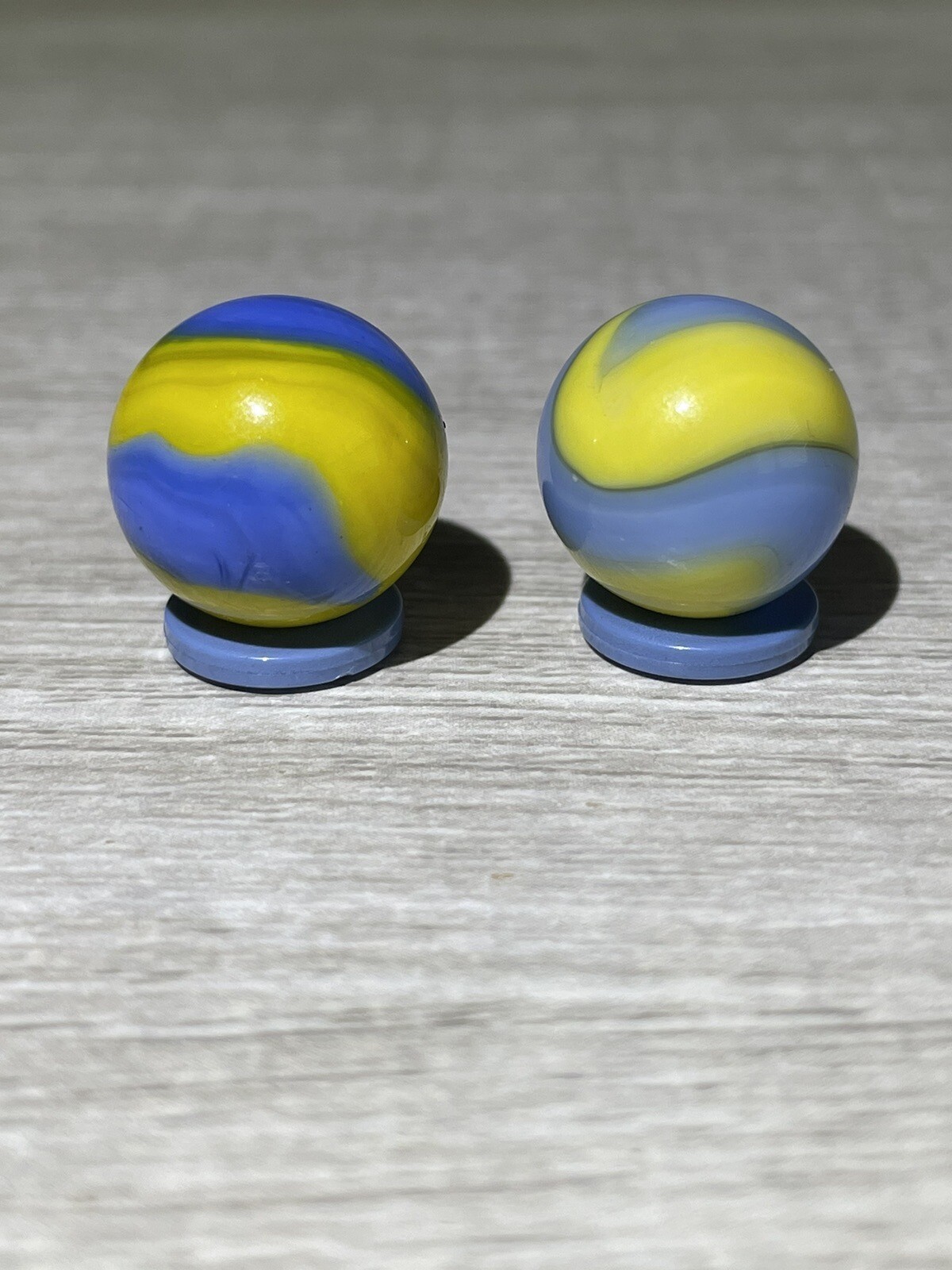 Two Akro Agate Cub Scout Corkscrews Vintage Marbles