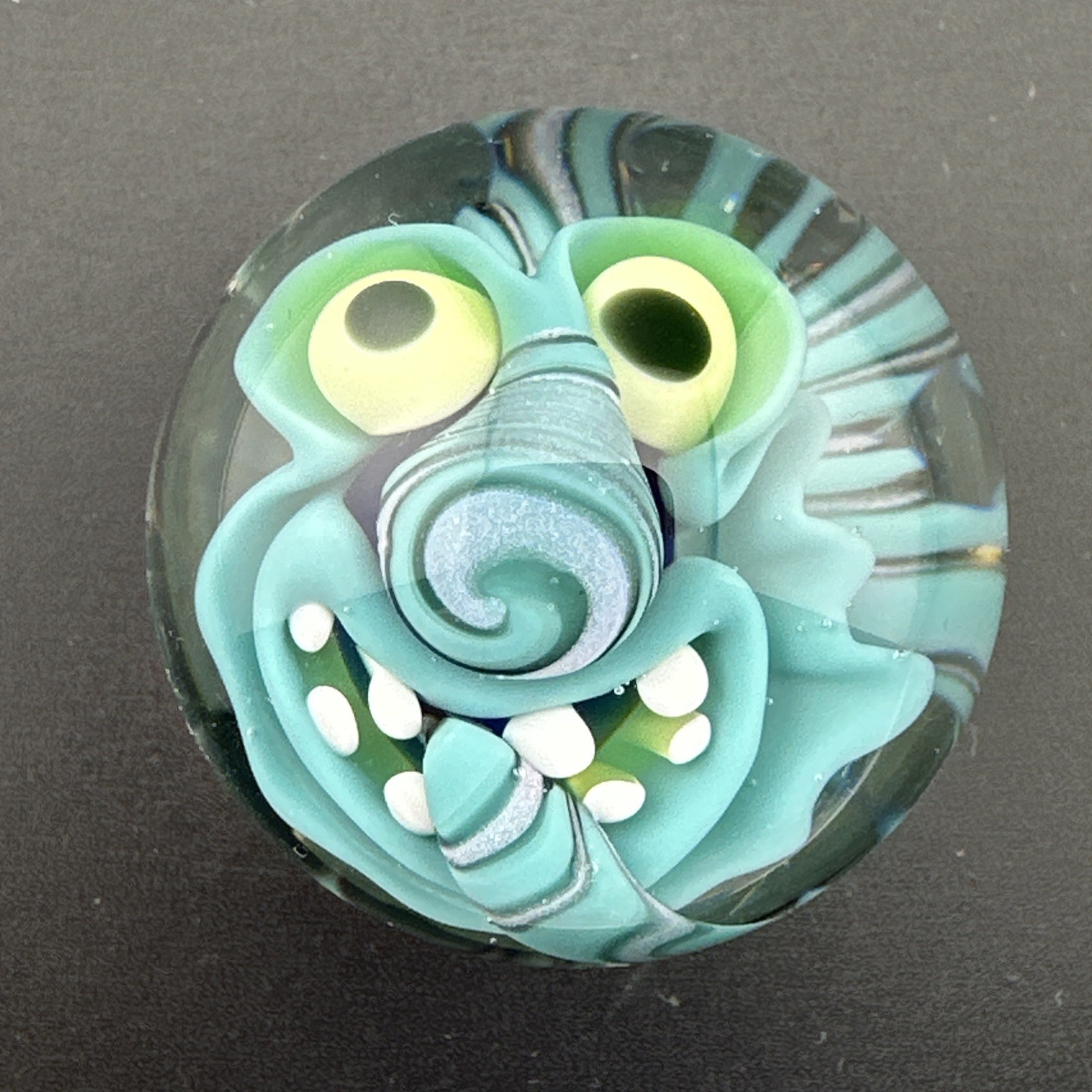 Contemporary Handmade Art Glass Marble 1.46″ Blue Monster, Flower, + UV Glow!