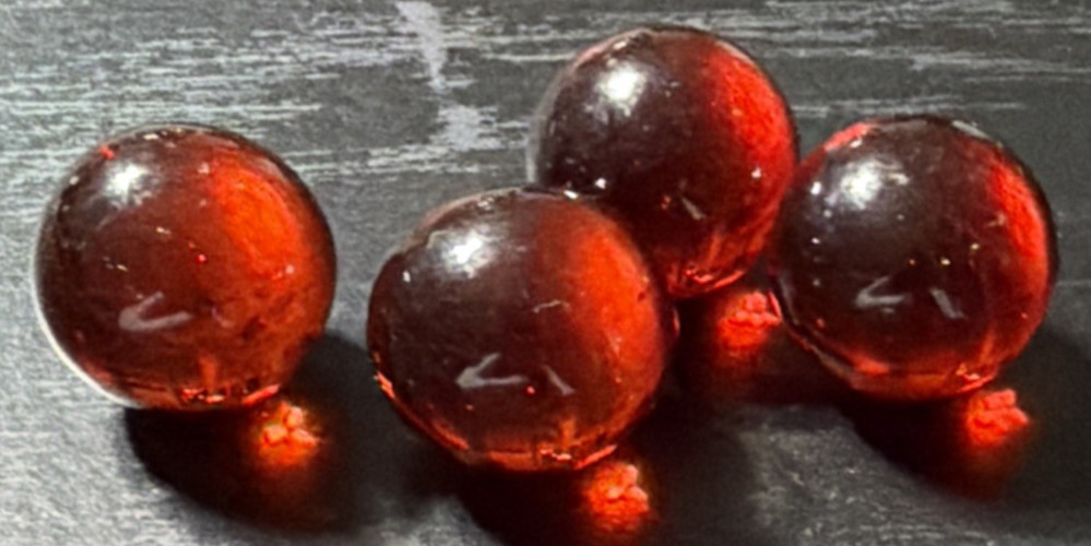 Vintage Lot of 4 Clear Ruby Red Cadmium Slag Glass Marbles UV Reactive As Is