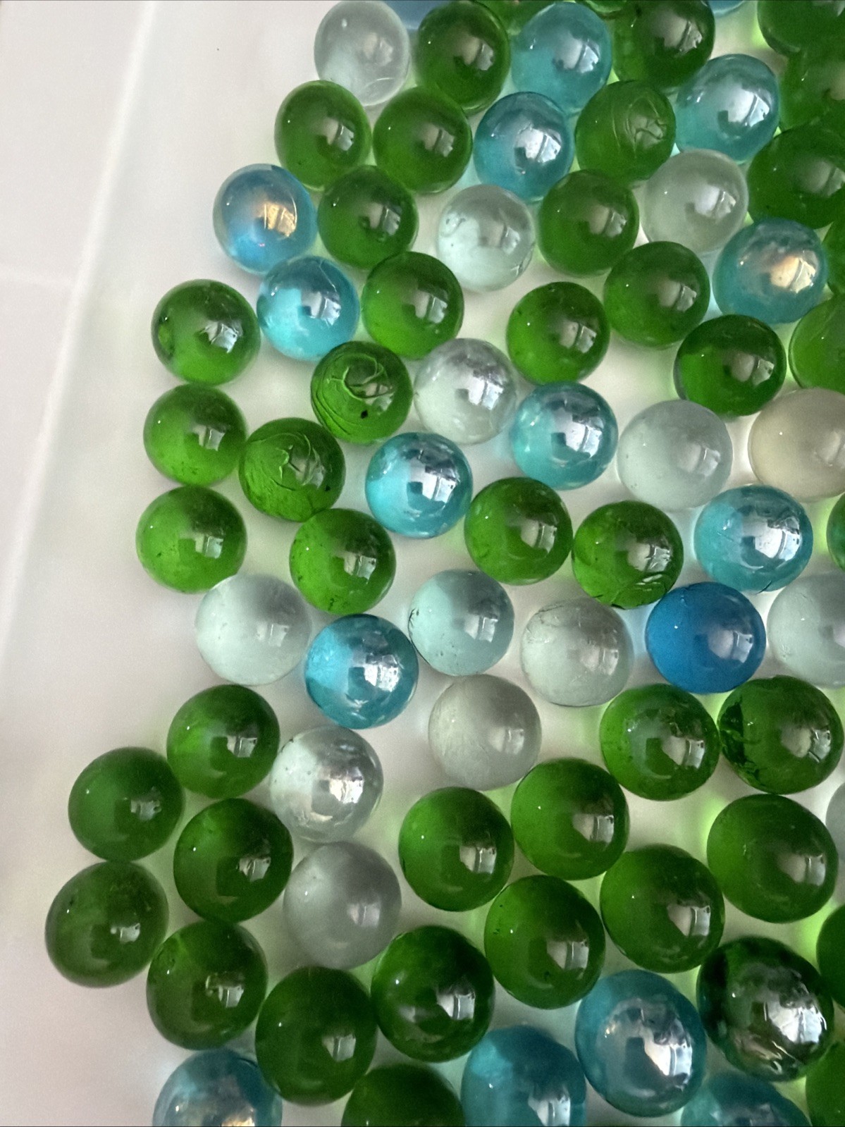 Lot of Assorted Marbles 1 pound 14 ounces, clear and green And Blue