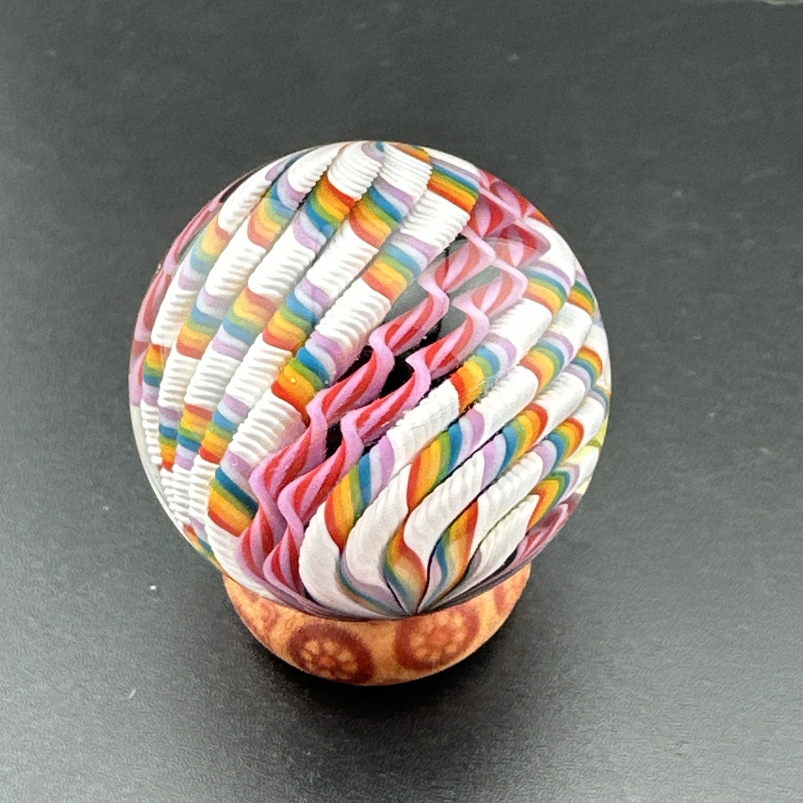 Contemporary Handmade Art Glass Marble 1.34″ Rainbow White Pink Cane, Black Core