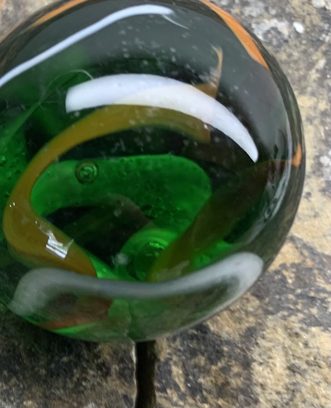 Glass Marble 1.5” In Diameter. Used. Green With Swirls