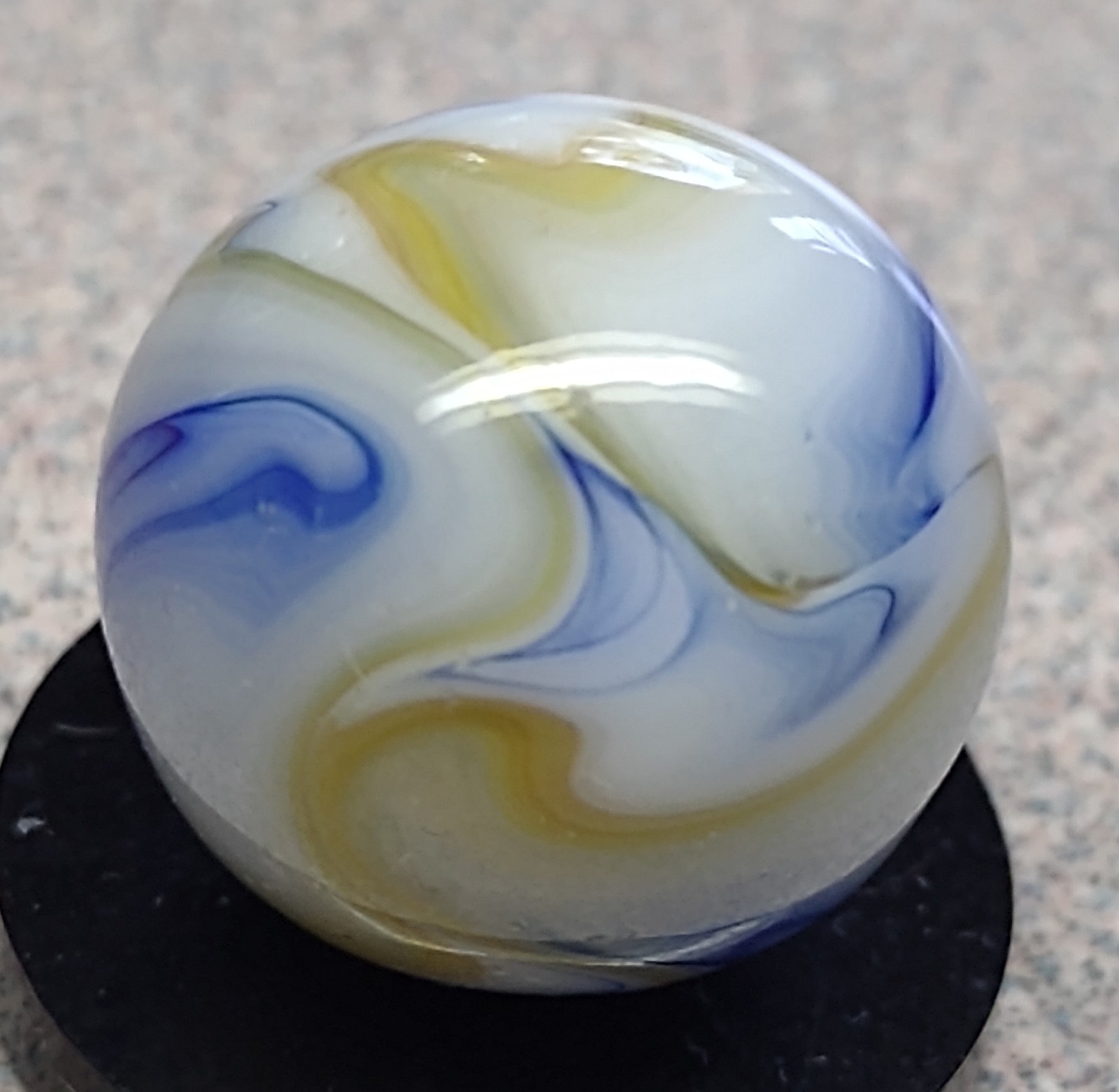Stunning Ravenswood Swirl marble-.62″ NM cond. White w/Blue & Tan swirls-rust