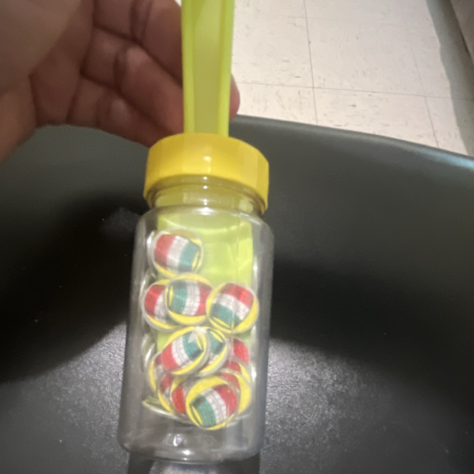 Mixed Multicolor Swirl Toy Marbles, Clear Plastic Jar, Yellow Lid, Green Scoop