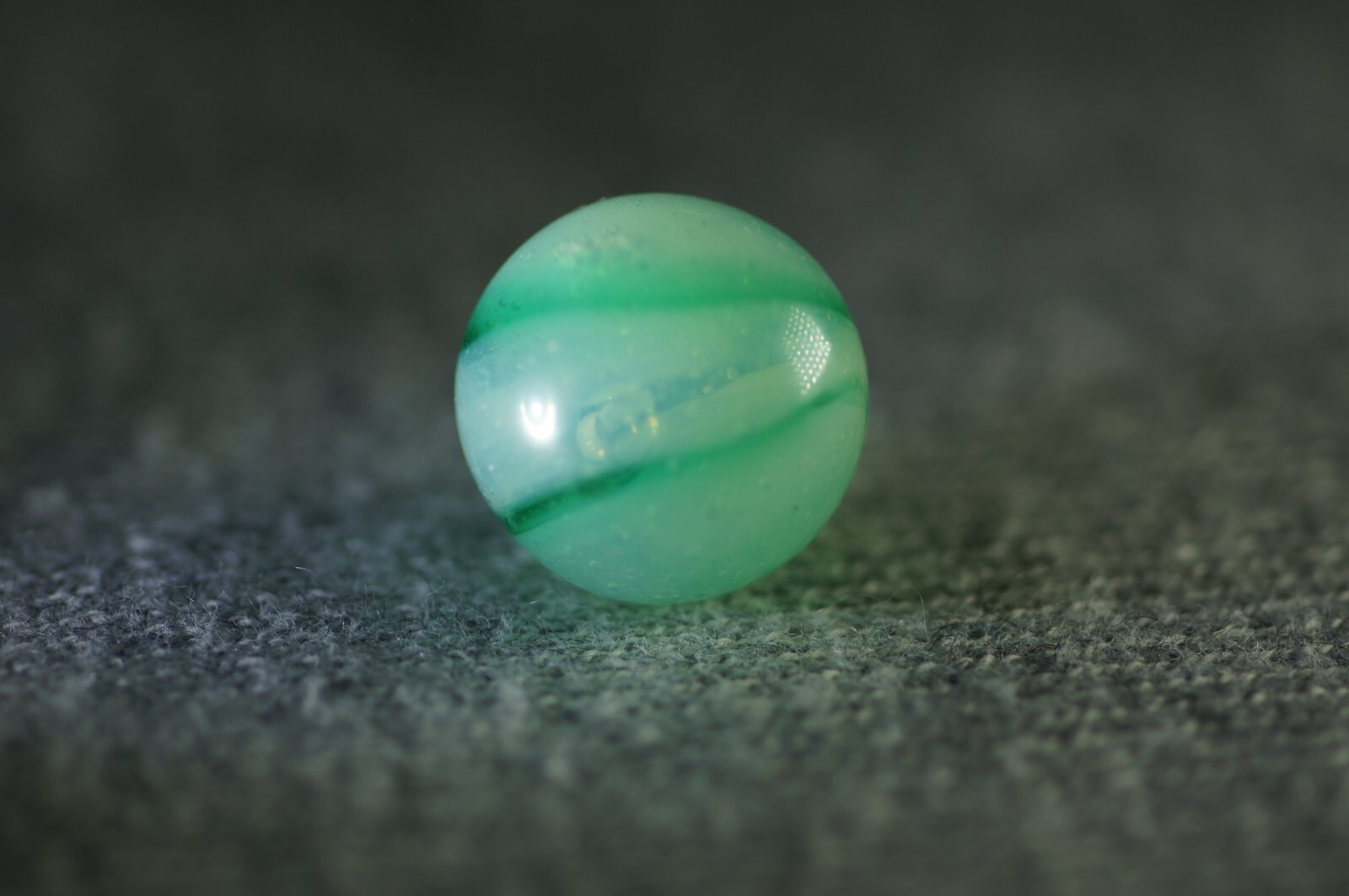 Akro Agate Transparent Green Spiral on Translucent Base #187