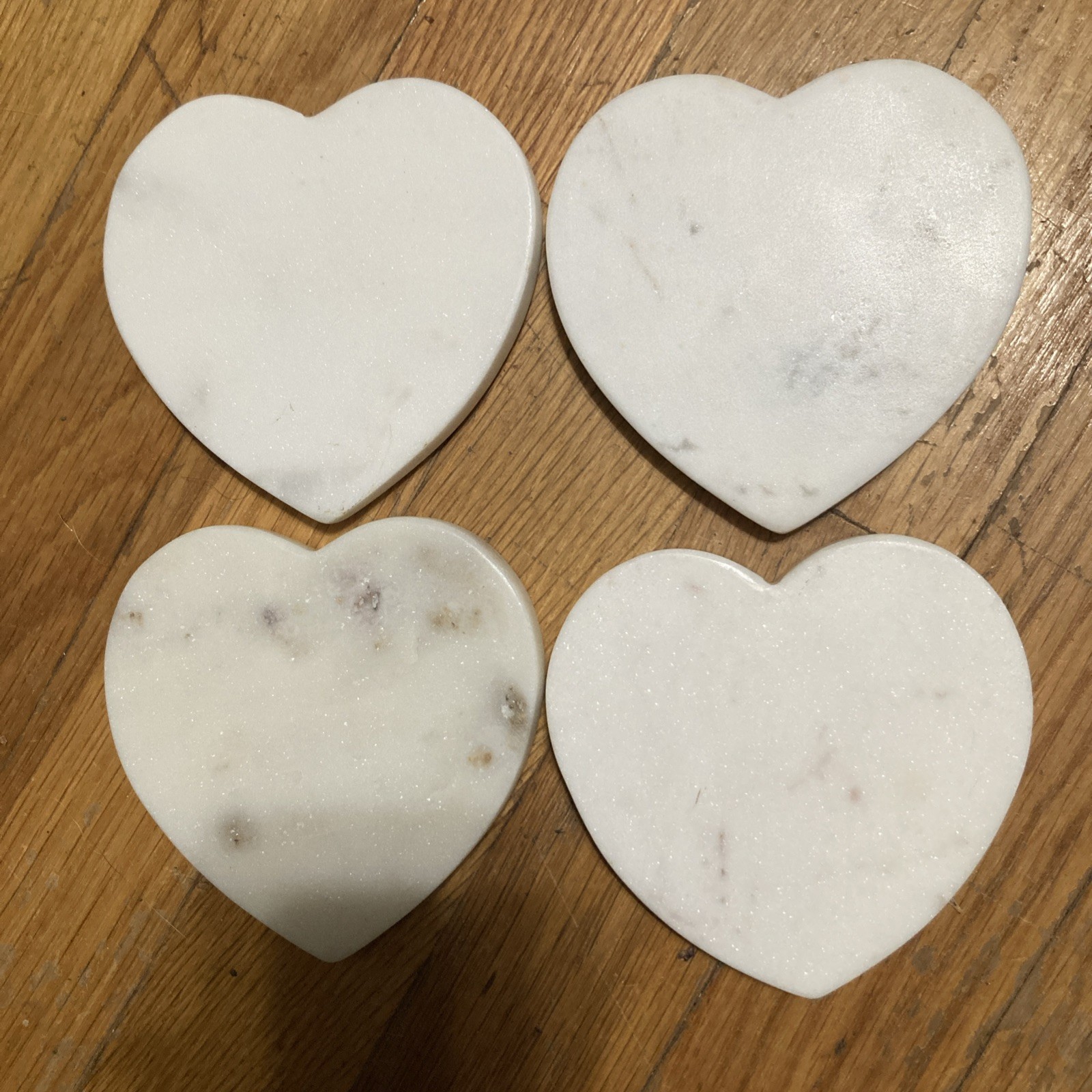 Four Heavy Marble Hearts