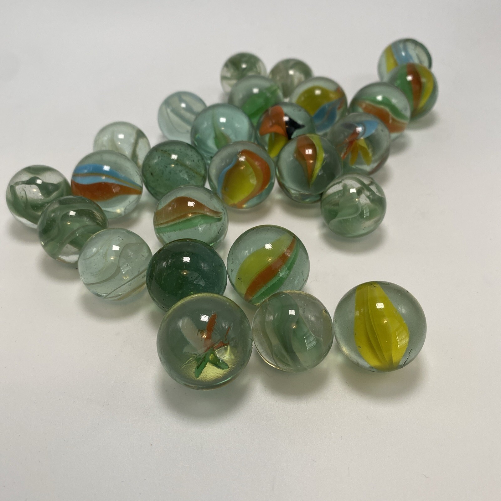 Lot Of 26 Cat’s Eye Glass Marbles Yellow Green Blue Orange White Assorted Sizes