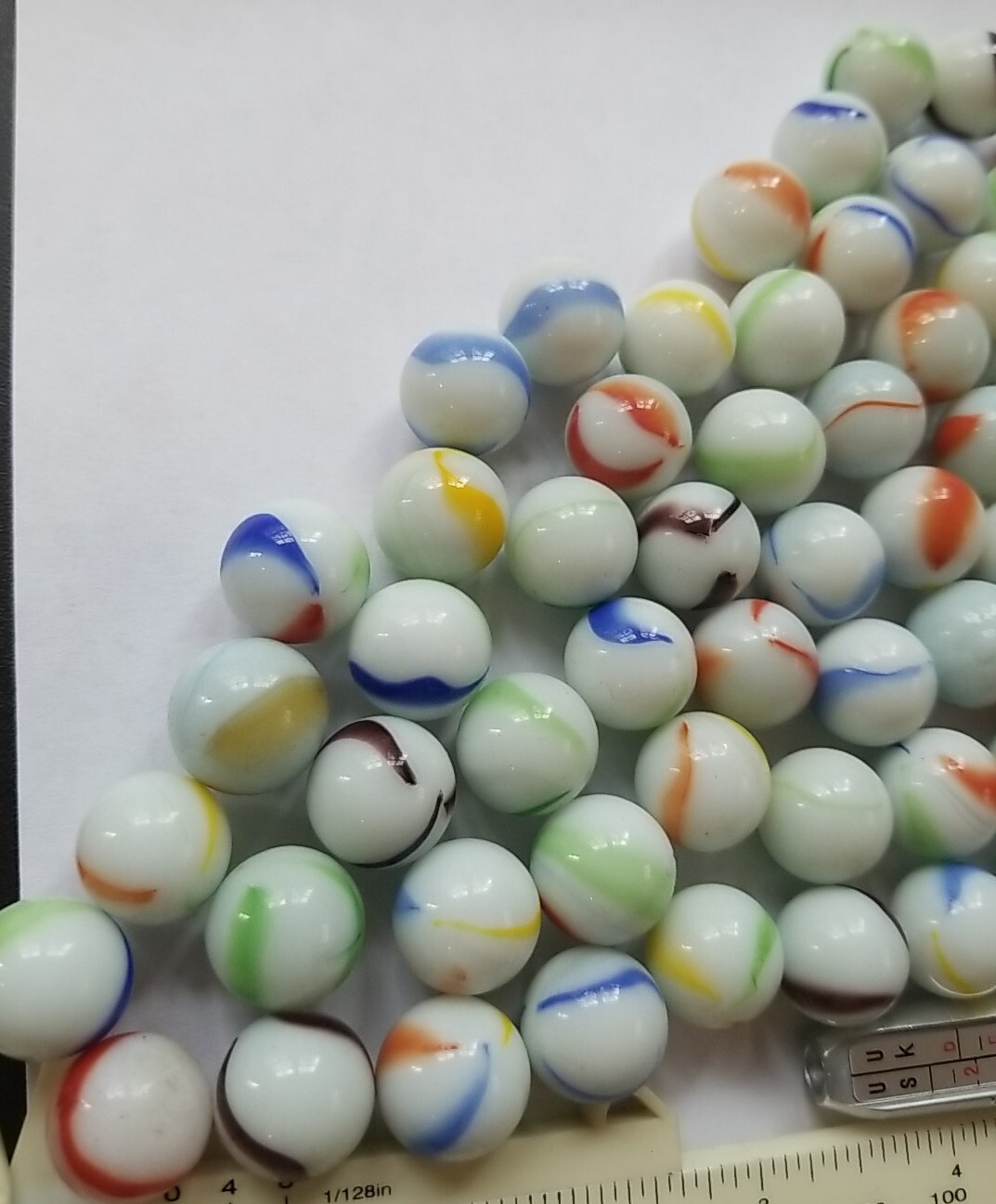 102 Standard Size Marbles Colors On White