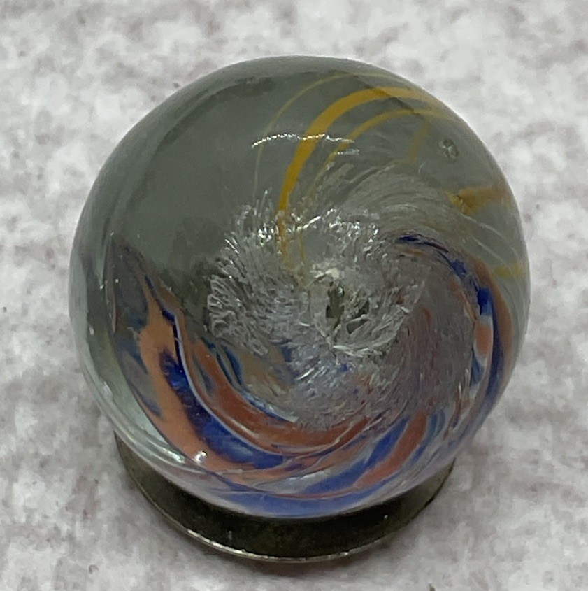 A Vintage German Handmade Core Less Swirl. Measures .68” In Mint Condition
