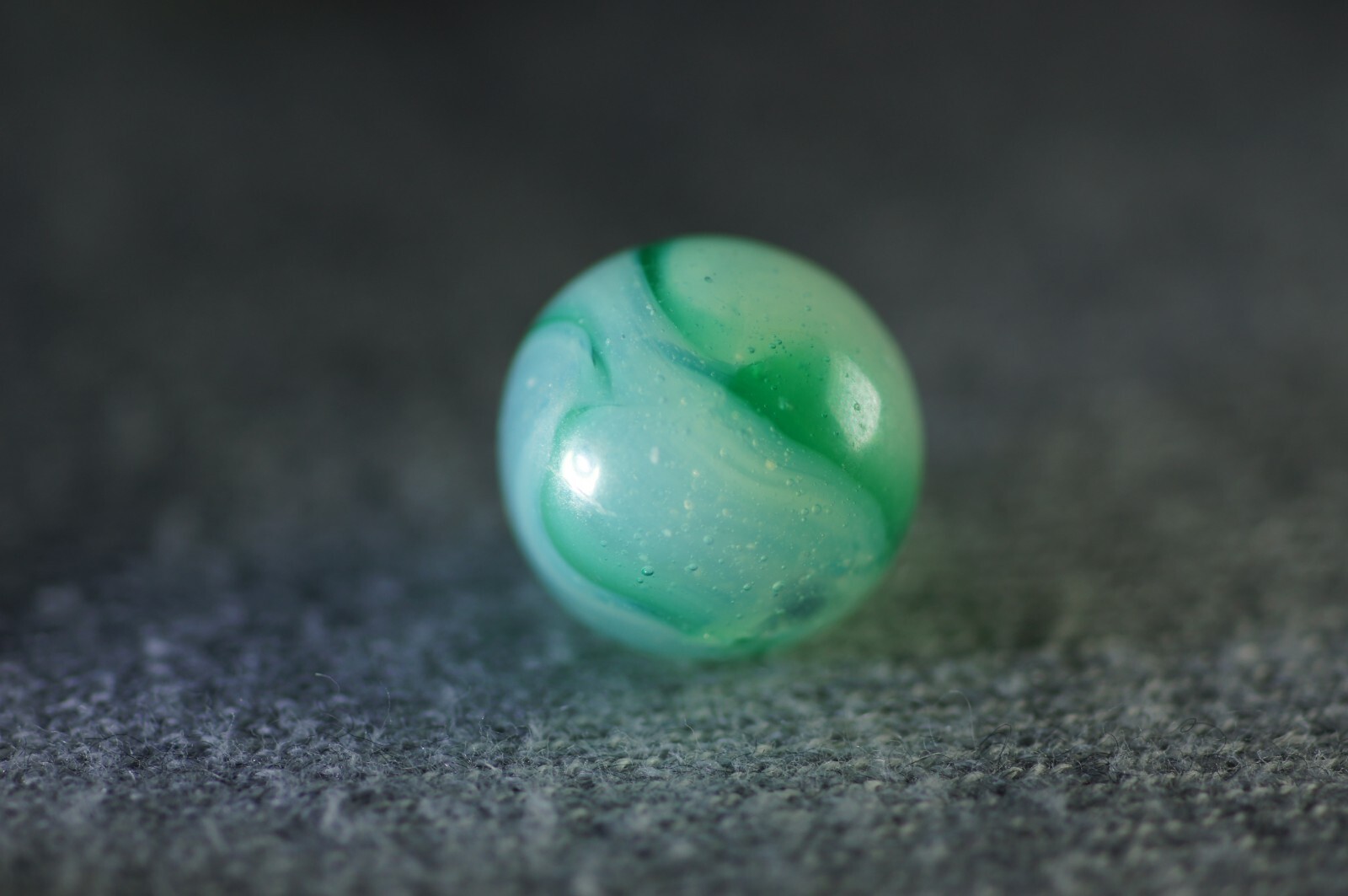 Akro Agate Transparent Green Spiral on Translucent Base #187