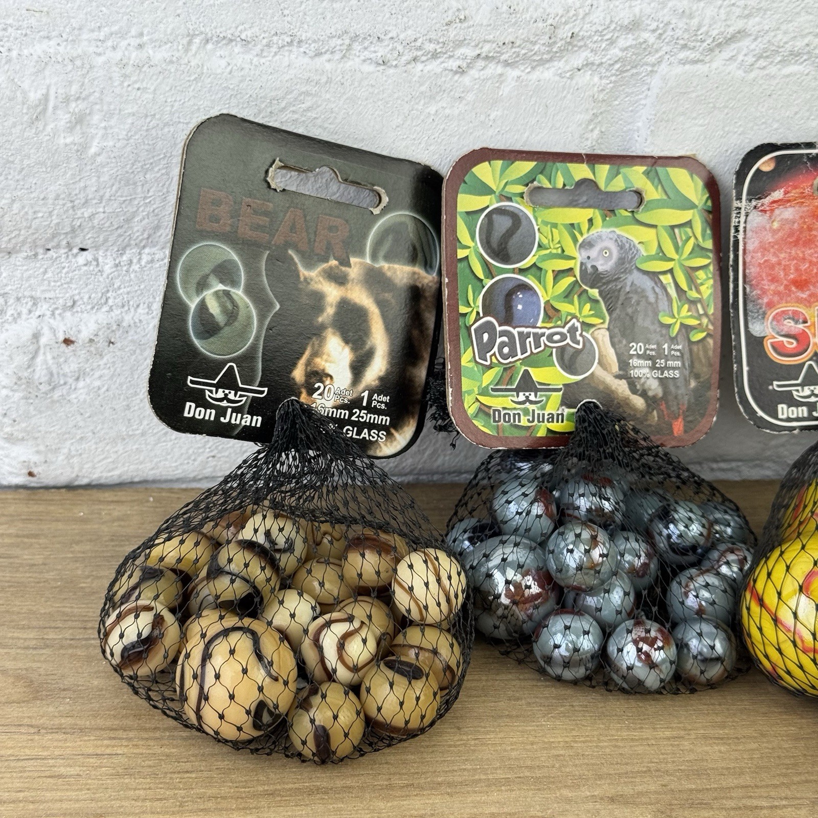 4 Net bags Vacor de Mexico – Bear – Parrot – Morelia – Sun Boulder marbles