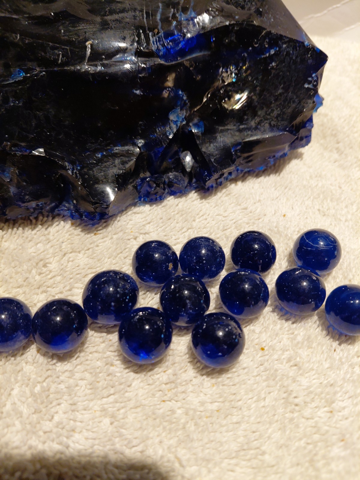 5.5″x3.25″ piece of cullet from Cobal Blue marble runs, With Marbles Includ