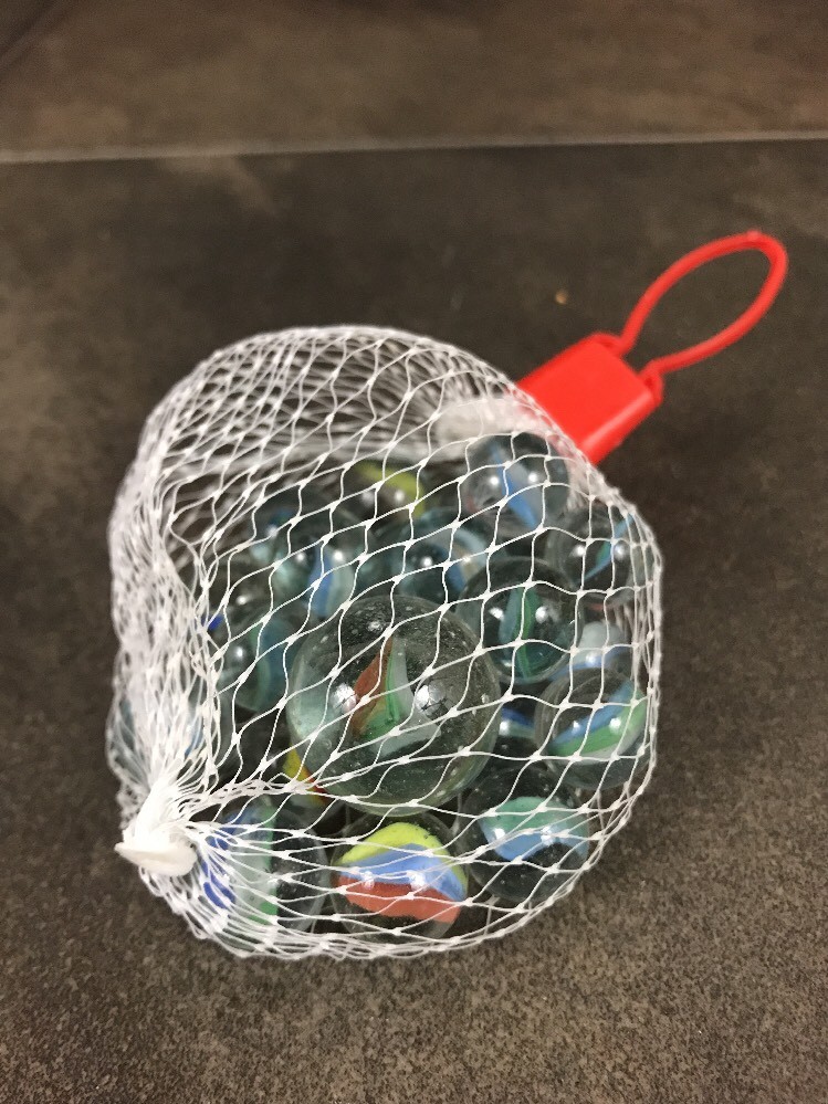 glass marble set – netted bag of 21 assorted marbles