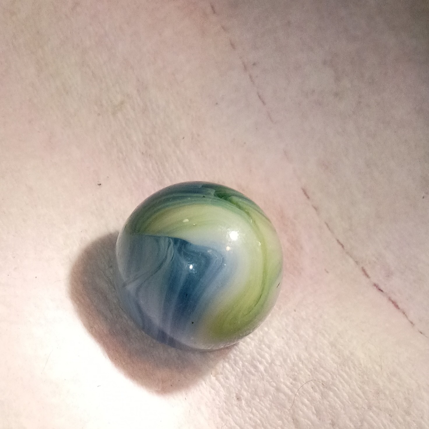 Blue, Green, and White Swirl Machine Made Toy Marble for Ages 17 Years & Up