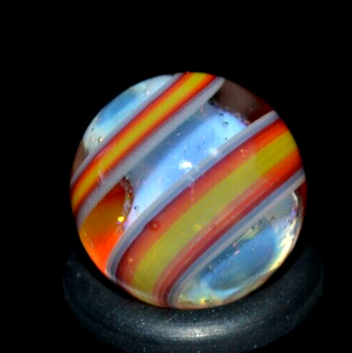 BRYAN TRILLAS GLASS MARBLE/.560″-VIOLET BLACKLIGHT W/YELLOW & RED RIBBONS-FAST