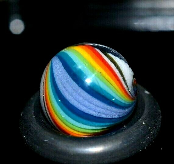 BRYAN TRILLAS GLASS MARBLE/.432″-WHITE STRIPE RAINBOW UV-NEON GREEN UNDER BLACKL