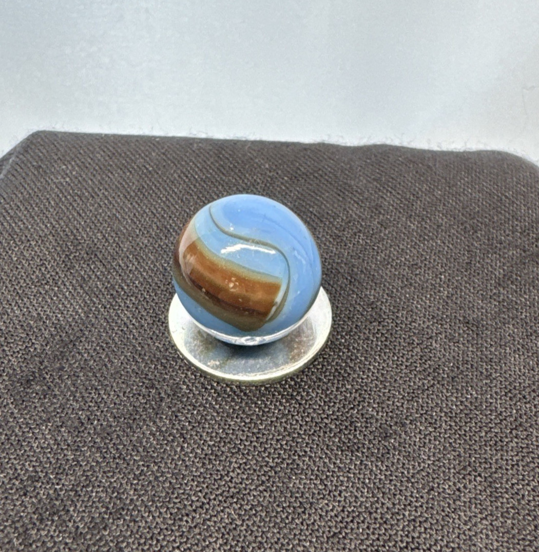 Christiansen Agate Opaque Blue Base With Brown Swirls..63″ Wet Htf Brown