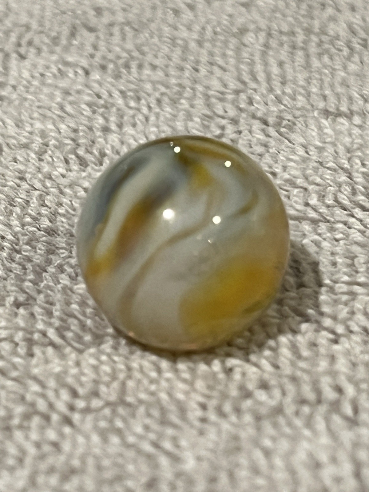 Alley or Champion Yellow Gold Translucent Furnace Swirl .63 Wet Mint